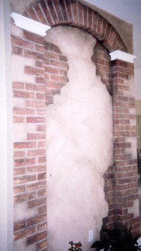 Faux 3-D brick and glazed plaster