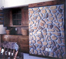 Hand painted faux logs and stone wall