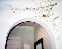 Frieze of birds on branches